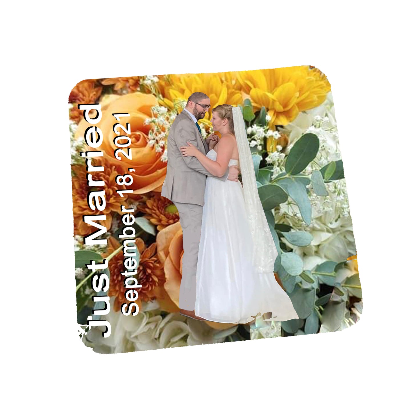 brides wedding flowers in the background, bride and groom dancing along with wedding date.